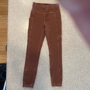 Lululemon 24 inch leggings with side pocket.